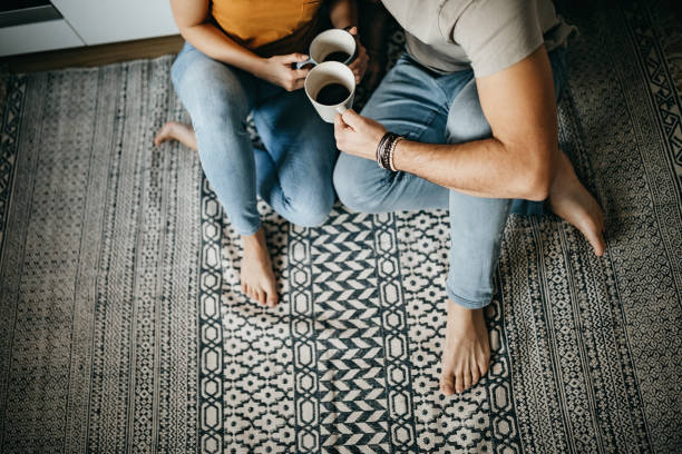 Couple drinking coffee | Dalton Wholesale Floors