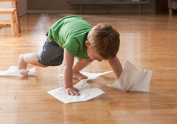 Kid cleaning floor | Dalton Wholesale Floors